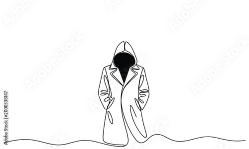 Anonymous person wearing a hooded trench coat.