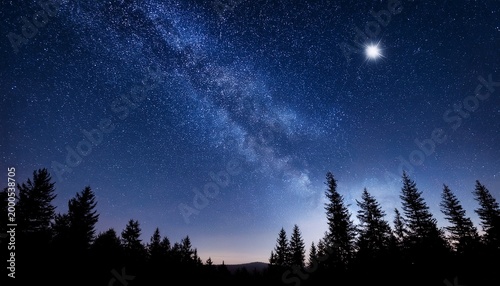 A Starry Night Sky With A Large Bright Star In The Center The Sky Is Filled With Stars And The Moon Is Visible The Trees In The Background Are Silhouetted Against The Sky Creating A Peaceful