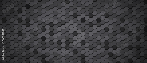 Staggered hexagon tile pattern, dark gray with scattered accents.