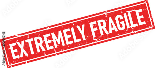 Distressed red rectangular rubber stamp with the words EXTREMELY FRAGILE printed in white