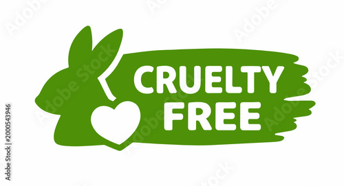 Green brush stroke badge featuring a rabbit silhouette with a heart symbol and bold white text Cruelty Free. Animal rights and vegan cosmetics concept.