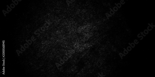Distressed quartz granite abstract dark black wall texture. black paper stone concrete rough dark floor. old grunge backdrop interior vintage smooth closeup background.
