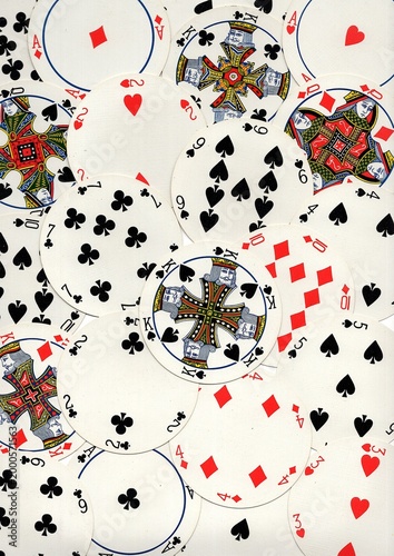 A montage of vintage round playing cards on a white background.