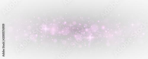 Festive abstract background with luminous stardust and glowing particles. Glittering confetti and shimmering lights, a bright holiday scene full of glamour and fantasy.