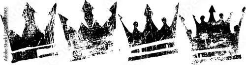 Grunge crown stamps set with textured distressed black ink on white background