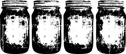 four vintage glass jars with textured surface isolated on white background, rustic kitchen storage containers