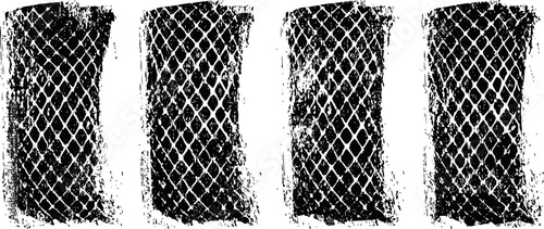 Worn tire tread patterns in black and white, rubber texture with diamond and line designs, used vehicle surface close up