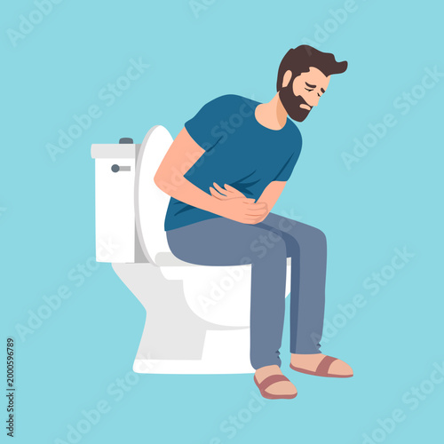man suffering from diarrhea sitting on toilet room