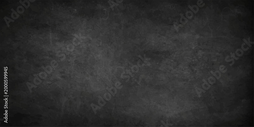 An aged blackboard, a testament to countless lessons and ideas, stands ready to embrace new concepts. Its texture whispers of knowledge.