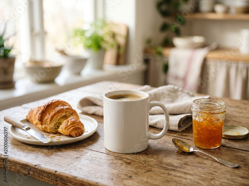 Breakfast with pastries and jelly on table