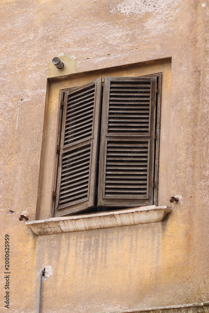 Fototapeta premium old window with shutters