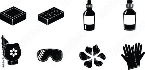 Set of black spa salon and cleaning supplies icons including soap sponge and oil bottles