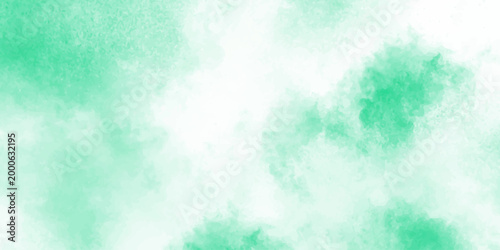 soft and serene green background with white clouds creating a peaceful and calming atmosphere. The gentle gradient of colors and perfect for use in design projects that require a soothing and natural
