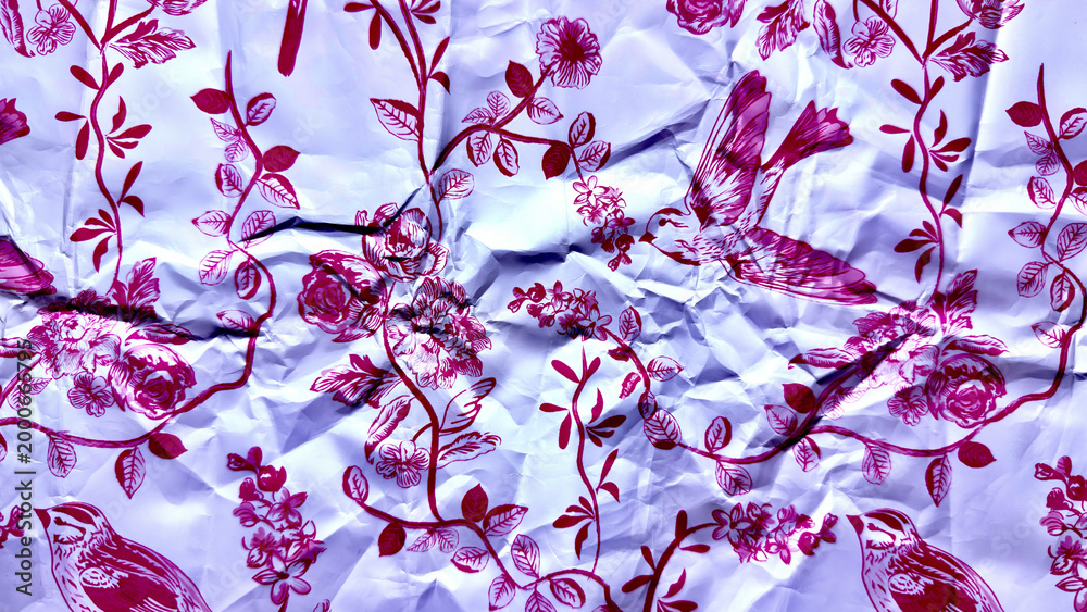 Naklejka premium crumpled magenta hummingbird fluttering among intricate rose vines on wrinkled lavender paper texture evoking whimsical vintage charm