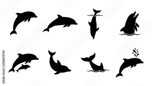 Fotografía Dolphin silhouette vector set, black aquatic animal icons in various jumping and