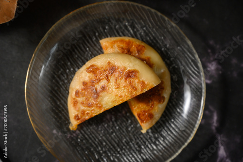 The delicious Orleans chicken pancake on the plate on the table