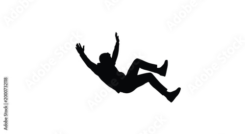 Defying Gravity: A striking silhouette captures a person in mid-fall, their arms outstretched in a dramatic expression of descent.
