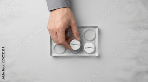 Layoffs market downturn concept employee termination hand stamp office human resources Layoffs market downturn concept show employee termination with hand stamp desk human resources decision