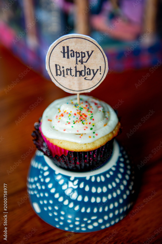 Obraz premium A birthday cupcake decorated with a Harry Potter style 