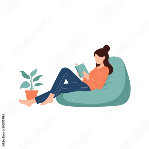 Woman reading book on beanbag chair