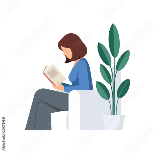 Woman reading book on sofa with plant