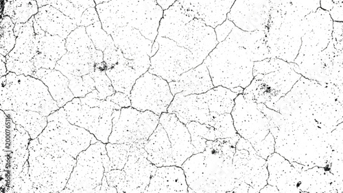 Cracked earth surface with dry mud and small holes and cracks pattern background