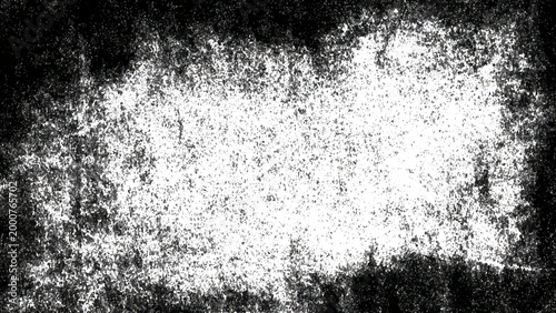Grunge texture with black and white speckles and scratches abstract background
