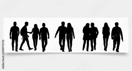 Silhouettes of people walking together.