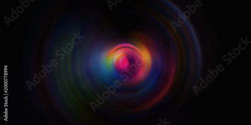 Concentric glowing colorful rings on black background with soft radial motion blur and artistic grainy texture for graphics.