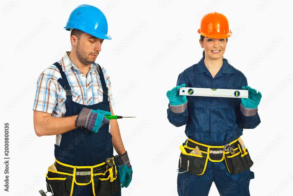 Fototapeta premium Two workers stand ready for construction tasks