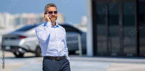 Ambitious businessman use phone. Business call. Busy businessman talking phone. Office worker talking on phone outdoor. Businessman talk on smartphone. Businessman phone conversation
