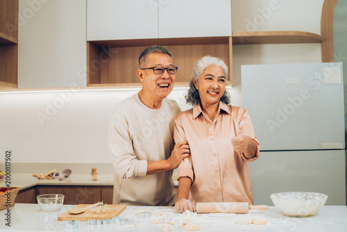 Senior Couple Baking Together at Home Kitchen
