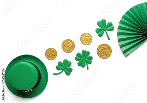 Green leprechaun hat with gold coins and shamrock clovers for saint patricks day celebration and holiday party
