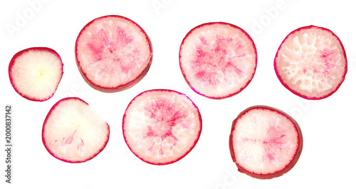 Set of fresh red radish slices isolated. Top view of organic radish cross sections with vibrant pink patterns. Healthy vegetable ingredients for salad and cooking concepts.