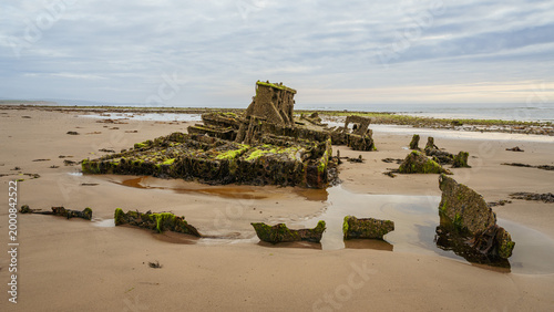Stones on the beach and the ST Pasages Shipwreck between Ballasalla and Sartfield, Isle of Man