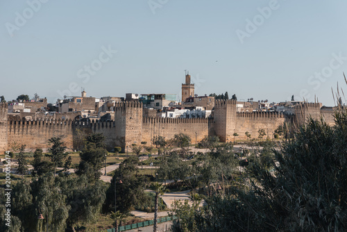 Photos Fes city showing the ancient medina defensive walls, fortifications, and a minar