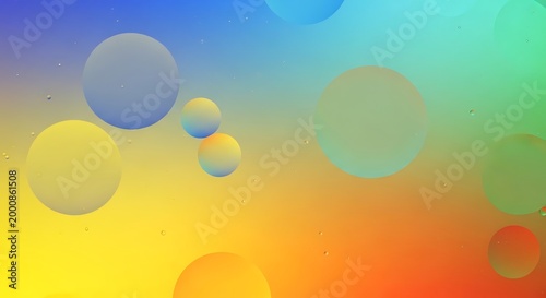 Quadro su tela Close-up of colorful soap bubbles on a background with water surface color gradi