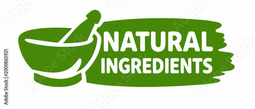 Green grunge brush stroke badge featuring a mortar and pestle icon and bold white text Natural Ingredients on a white background. Herbal remedy and organic cosmetics concept.