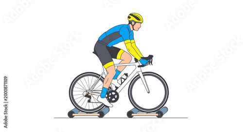 Active male athlete wearing cycling gear and helmet trains on a roller trainer indoors practicing endurance and balance for race preparation demonstrating healthy lifestyle and athletic pursuit