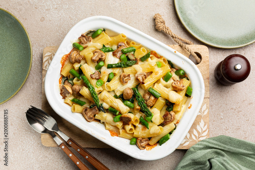 Bild auf Leinwand Top view of baked italian pasta with asparagus, cheese and mushrooms