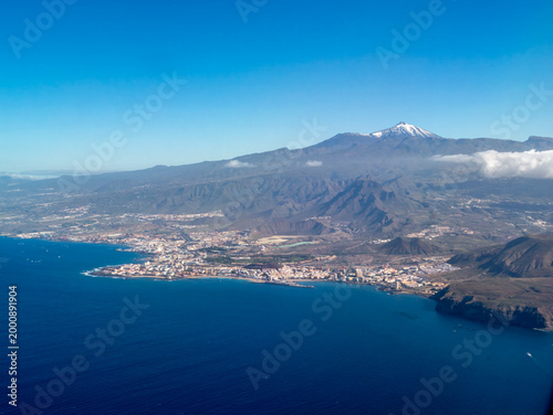 Approaching Tenerife South Airport. In the background is Mount Teide, partially covered in snow.