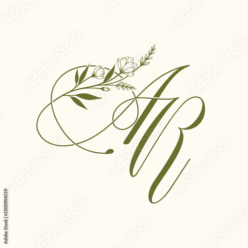 Elegant Calligraphy Monogram AR with Floral Embellishments.
