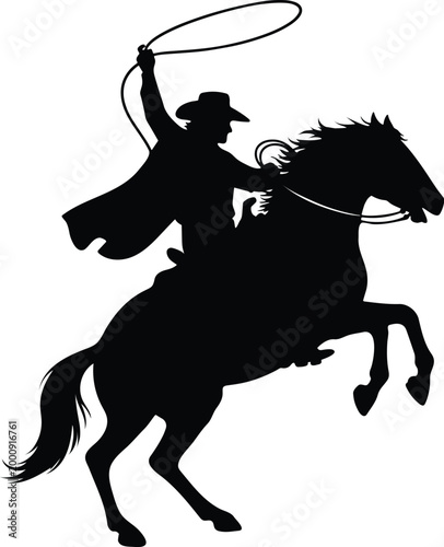 Cowboy riding horse with lasso.