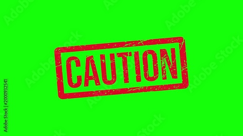 Red Caution Rubber Stamp Animation with Grunge Texture and Fragment Transitions on White and Green Screen Background.