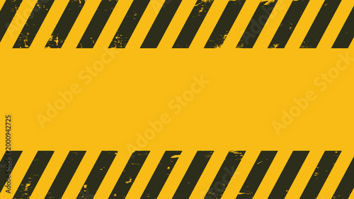 Fotografia Seamless black and yellow diagonal hazard warning stripes texture background for