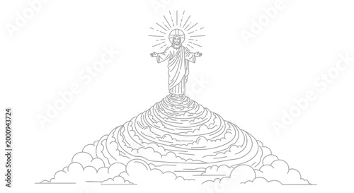 Jesus Christ statue on mountain top.
