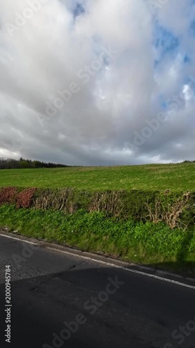 Scottish Rural Country road Hills Near Glasgow Scotland. Car Mounted Camera Footage During Drive Through Rural Area.