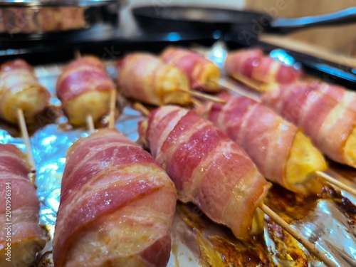 Juicy lula shashlik on wooden skewers. The meat is aromatic and appetizing, highlighting the Eastern cuisine.