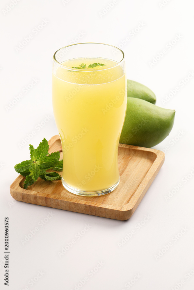 Fototapeta premium Aam Panha cooling juice made mostly during summer in India, garnished with mint leaves... 
