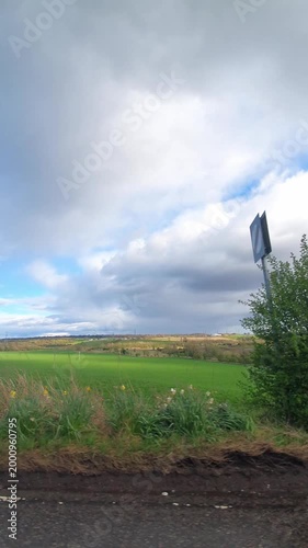 Scottish Rural Country road Hills Near Glasgow Scotland. Car Mounted Camera Footage During Drive Through Rural Area.